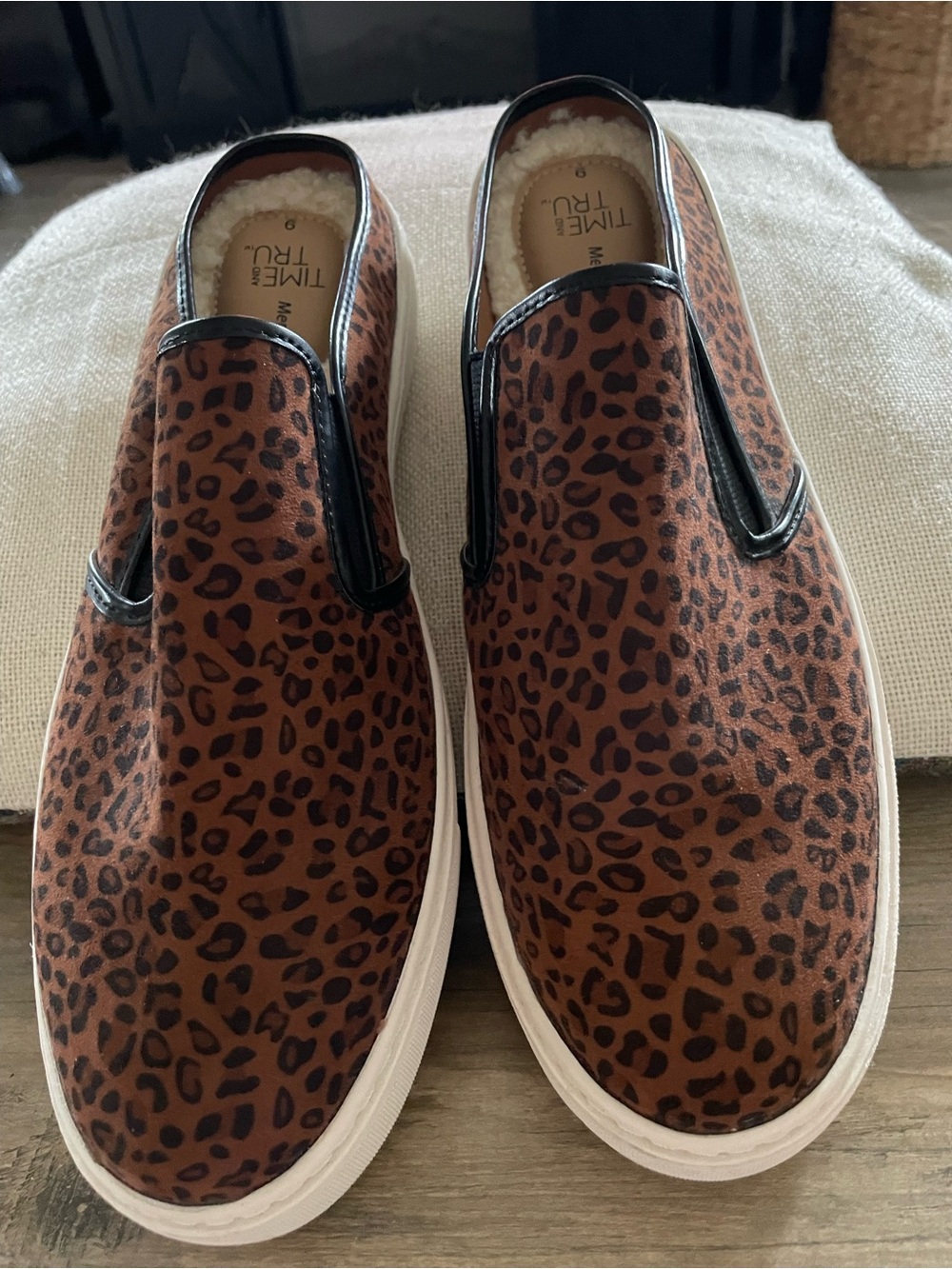 Time and Tru Leopard
Print slip on sneaker w Faux fur sherpa lined memory foam 9